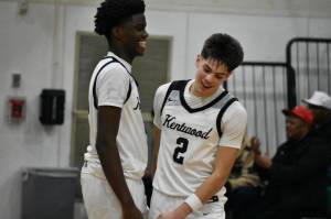 Brandon Tagle (right) and Caleb Ross (left) celebrate the win over Kennedy. Ben Ray / The Reporter
