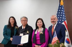 King County Council members Steffanie Fain (far left) and Jorge Barón present the Korean American Day Recognition Jan. 13 to Eunji Seo, Consul General, Republic of Korea and Seong H. Kim, chair of the Korean American Day Festival Foundation. COURTESY PHOTO, King County
