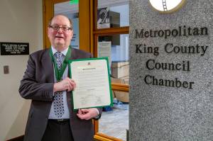 Dwight Dively poses with the proclamation and the MLK Medal of Distinguished Service. Photo courtesy of King County