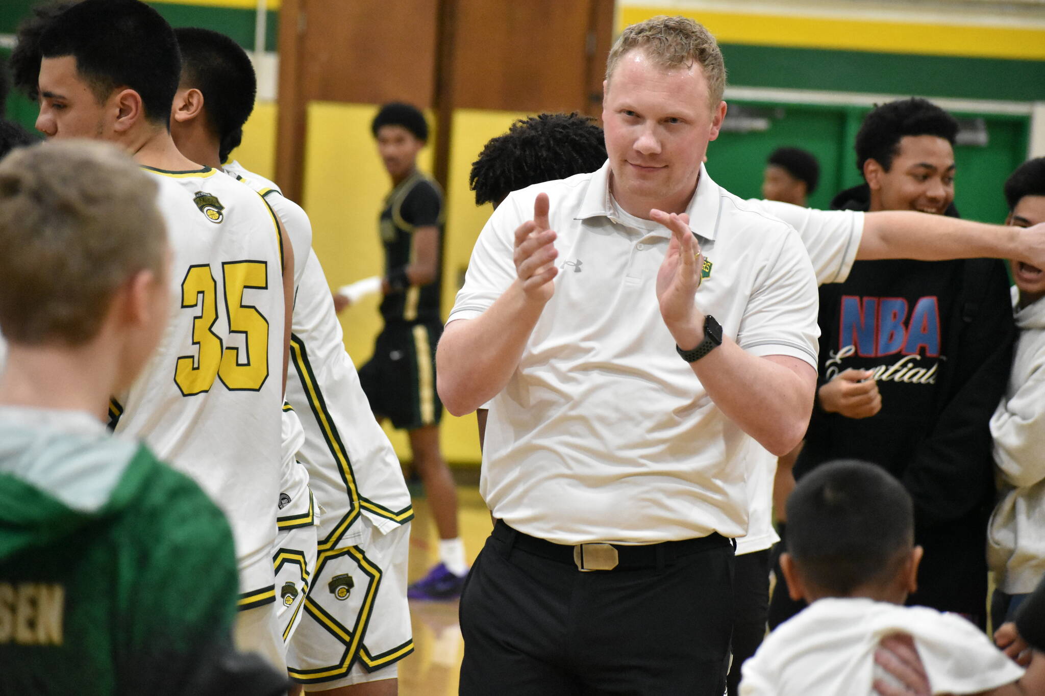 Kentridge head coach Zac Webb claps as he wins his biggest game as the Chargers head coach. Ben Ray / The Reporter