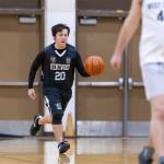 Peter Hoggard dribbles the ball up the floor for Kentwood. Photo provided by Robby Mullikin
