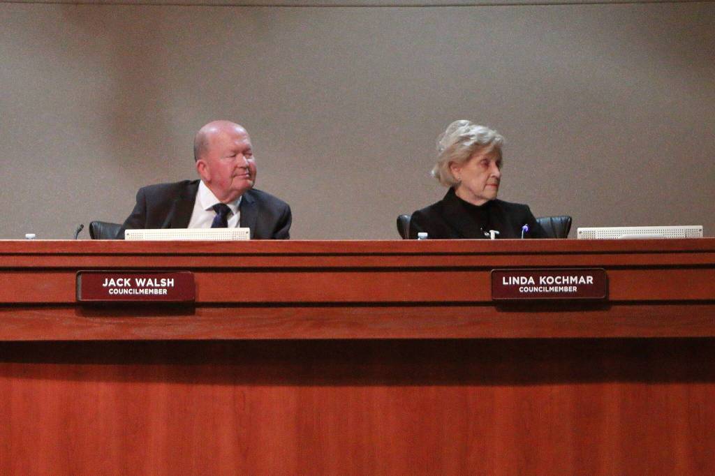 Councilmember Linda Kochmar (right) brought forward the motion to rescind the vote in which Councilmember Martin Moore was elected council president and Councilmember Jack Walsh (left) seconded it. Here they are listening to public commentors. Photo by Keelin Everly-Lang / the Mirror