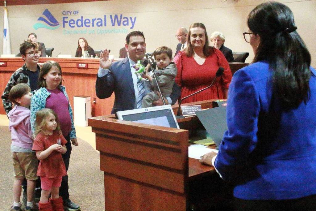 Martin Moore is sworn in as a new member of the Federal Way City Council on Jan. 6. However, the council voted Feb. 10 to rescind his title as council president. Photo by Keelin Everly-Lang / the Mirror