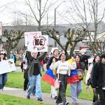 Students walked more than a mile and a half from Enumclaw High to city hall. Photo by Ray Miller-Still