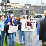 The man who was allegedly assaulted, pictured here on the right, was filming and interacting with students before the incident. Seconds before he was allegedly struck, he was surrounded by a group of yelling students; he began to blow an emergency whistle, but did not appear to attempt to leave the group. Photo by Ray Miller-Still