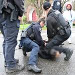 The student who allegedly assaulted a man at the walkout was arrested by the Enumclaw Police Department on Porter Avenue. The Courier-Herald does not typically identify students accused of a crime, and the photo has been blurred. Photo by Ray Miller-Still