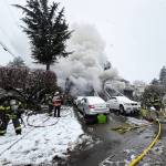 Smoke rises from the house fire March in the 26400 block of 137th Avenue SE. COURTESY PHOTO, Puget Sound Fire