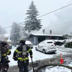 Firefighters put out a fire at a single-story house March 13 in the 11800 block of SE 274th St. in Kent. COURTESY PHOTO, Puget Sound Fire