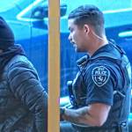 A Kent Police officer arrests a shoplifting suspect. COURTESY PHOTO, Kent Police