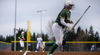 Kenzie Coble flips the bat against Hazen. Photo provided by Eric Todd / @ETDPI