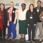 MultiCare Lake Meridian employees from left to right: Bridget Boreson, medical assistant; Maria Cook, clinic manager; Sarah Cerrato-Centeno, medical assistant; Erakwandra Joseph, health care worker; Kaylee Kosinski, receptionist; Marlon Agraan, RN care manager; and Erin Levinia Luar, medical assistant.