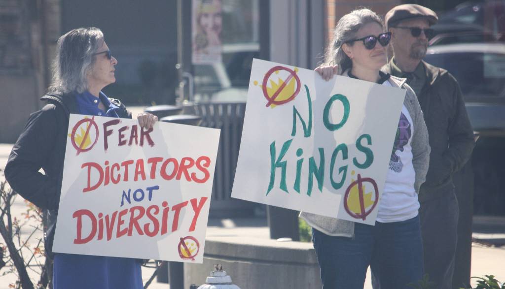 Protesters filled the sidewalks at the corners of West James Street and Fourth Avenue North and lined up along James Street by Kent Station. STEVE HUNTER, Kent Reporter