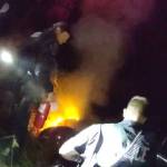 Officers approach a vehicle fire and help rescue the driver. COURTESY PHOTO, Kent Police