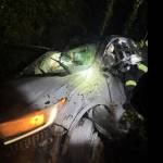 A vehicle that crashed down an embankment during a pursuit by Kent Police after the driver reportedly assaulted a manager at Safeways Washington Avenue location. COURTESY PHOTO, Kent Police