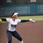 Katelyn Taylor makes a throw across the infield for Auburn Riverside. Ben Ray / The Reporter