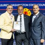 Greg Markley, center, of Puget Sound Fire, receives an International Association of Fire Fighters leadership award. COURTESY PHOTO, Puget Sound Fire