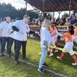 Kent Little League softball players are greeted by Kent City Councilmember Toni Troutner and others during Opening Day on April 18 at Ryan Brunner fields. COURTESY PHOTO, Toni Troutner