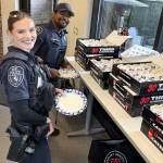 Officers enjoy a special delivery from Jimmy Johns at the Kent Police Department, part of National Police Week. COURTESY PHOTO, Kent Police
