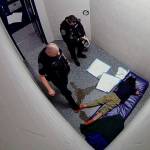 Kent corrections officers check on Rena Flaherty and one of them puts his boot on her foot to see if she is alive. COURTESY PHOTO, Court documents
