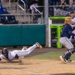 Lincoln Moore dives into home to score the winning run against Eastside Catholic. Photo provided by Robby Mullikin.