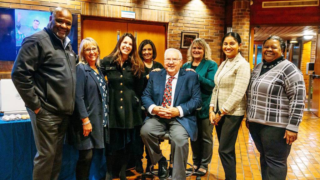 Les Thomas poses with the Kent City Council in December 2023 prior to his final meeting, ending his 20 years on the council. STEVE HUNTER, Kent Reporter