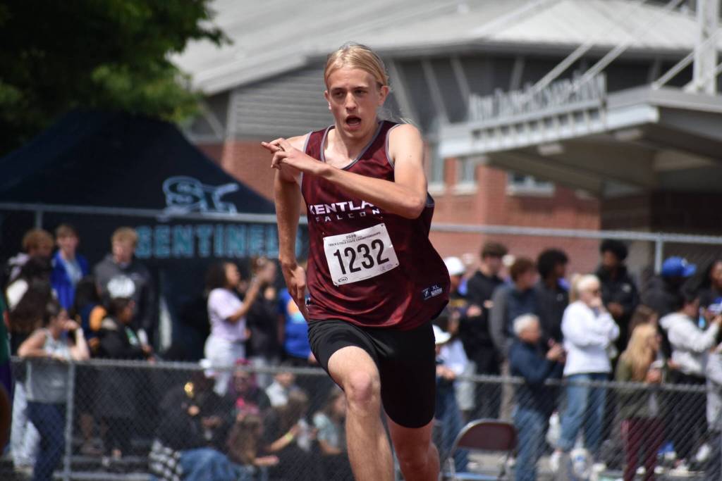 Theo Linstad runs up to the high jump for Kentlake. Ben Ray / Sound Publishing