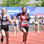 Renton relay runs at the WIAA state meet. Ben Ray / Sound Publishing