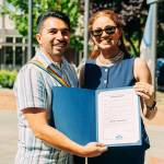 Kent City Council President Satwinder Kaur presents a proclamation making June Pride Month in the city to Juan Vasquez, deputy director of Entre Hermanos, which has offices in Seattle and Yakima. COURTESY PHOTO, City of Kent