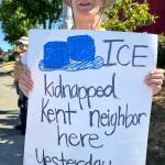 Protesters from Indivisible Covington and Indivisible Kent showed up June 14 along 104th Avenue SE after ICE arrested a Mexican man June 13 in the Saars Super Saver Foods parking lot. COURTESY PHOTO, Indivisible Covington/Kent
