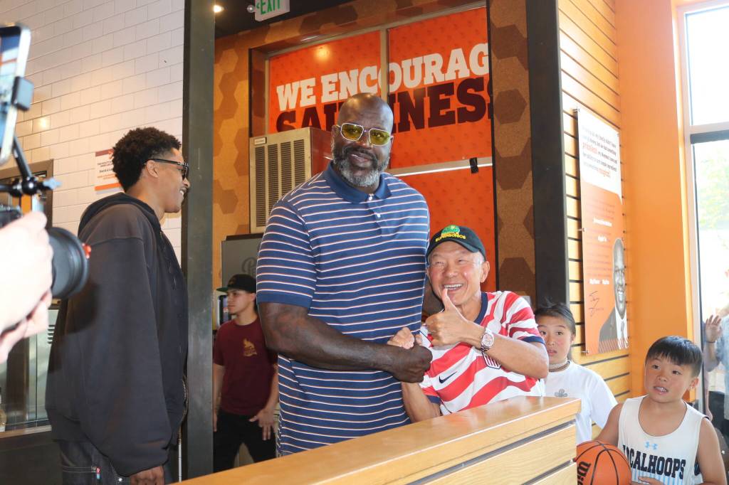 Shaquille O'Neal took photos with many people at the Big Chicken in Renton on June 21. Photo by Bailey Jo Josie/Sound Publishing.