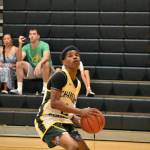 Jamir Harris eyes the basket for Kentridge. Ben Ray / The Reporter