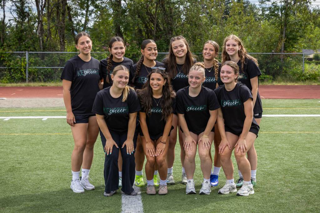 Kentridge coaches pose before drills begin at practice. Photo provided by Eric Todd.