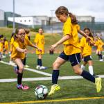 Soccer camp players playing sharks and minnows. Photo provided by Eric Todd.