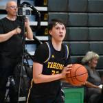 Tahomas Trevor Stonerock takes aim on a 3-point shot attempt. Ben Ray / The Reporter